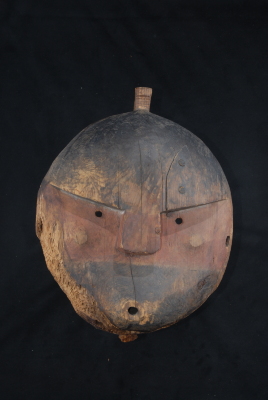 Carved mask (Akagngasqamek Giinalek--Round-Faced One)