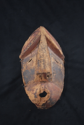 Carved mask (Umiartusqaq--Thinking One)