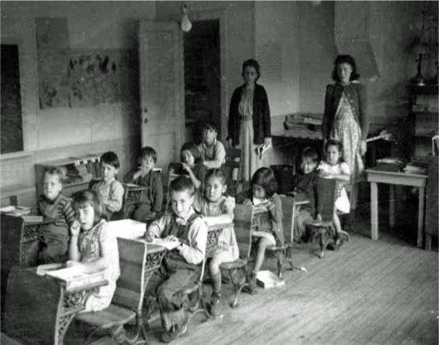 Children studying at the Ouzinkie School, ca. 1949.  Malinda Lamp Collection.