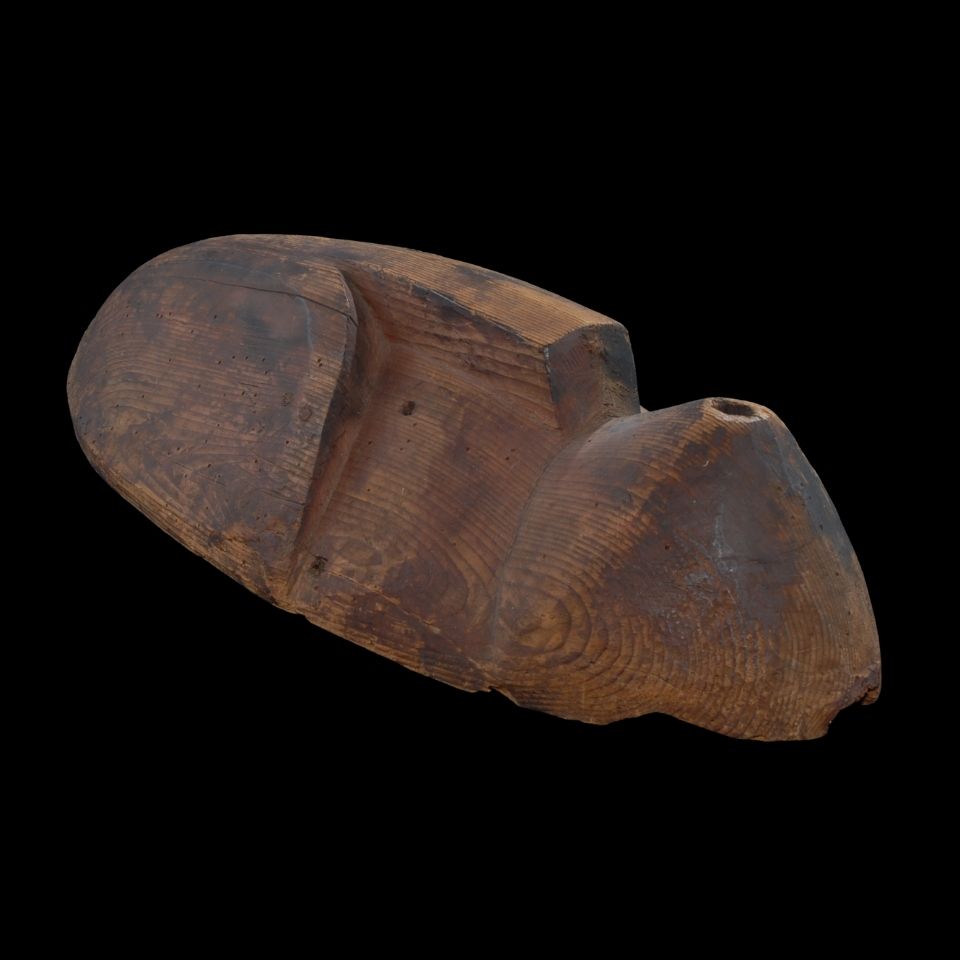 Mask with a puckered mouth, whistling.